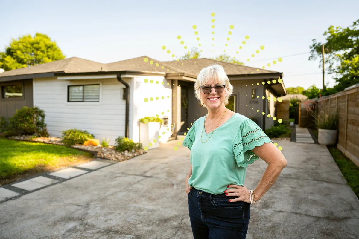 woman standing in from of house 